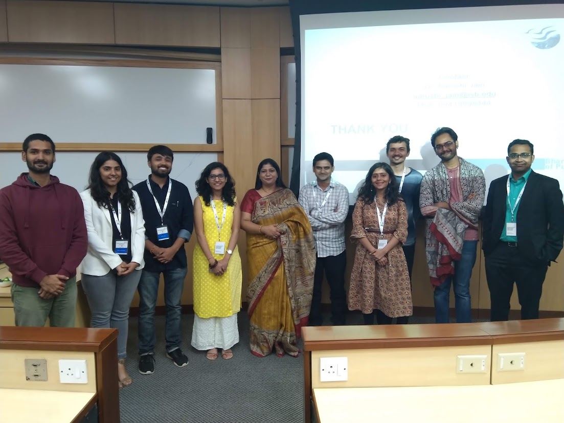 Fellows with a speaker after a fellowship session